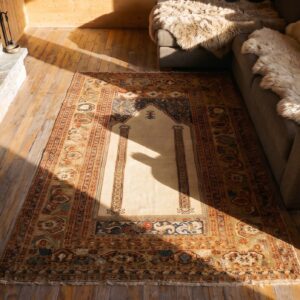 Mid 18th Century Antique Turkish Ghiordes Classic Mehrab Muslim Prayer Design Rug (SKU 24516) - styled overhead view