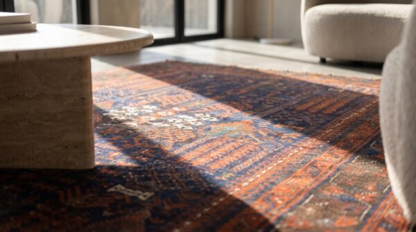 Mid 19th century antique tribal afghan baluch rug (sku 20323) - in-room detail