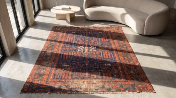 Mid 19th century antique tribal afghan baluch rug (sku 20323) - styled overhead view