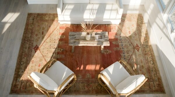 Antique minimalist open coral color field tribal persian sultanabad rug 2 Antique minimalist open coral color field tribal persian sultanabad rug (sku 23252) - styled overhead view