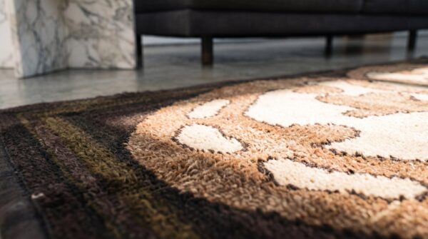 Minimalist open ivory color field antique american hooked rug 7 Minimalist open ivory color field antique american hooked rug (sku 17198) - in-room detail