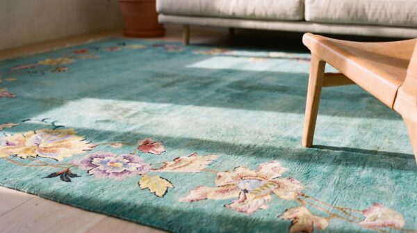 Minimalist open solid turquoise color field antique room size floral chinese art deco rug 11 Minimalist open solid turquoise color field antique room size floral chinese art deco rug (sku 19864) - in-room detail