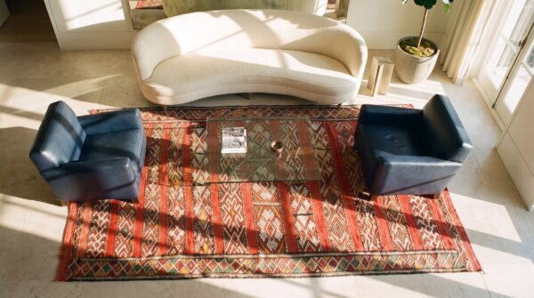 Antique moroccan coral rabat flat weave rug 2 Antique moroccan coral rabat flat weave rug (sku 25496) - styled overhead view