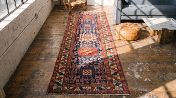 Antique n. W. Persian geometric medallion hand knotted hallway runner rug 2 Antique n. W. Persian geometric medallion hand knotted hallway runner rug (sku 18549) - styled overhead view