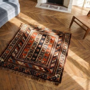 Antique N.W. Persian Small Square Scatter Size Wool Red Rug (SKU 22989) - styled overhead view