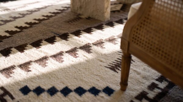 Antique navajo native american medallion white and black color flatweave rug (sku 23616) - in-room detail