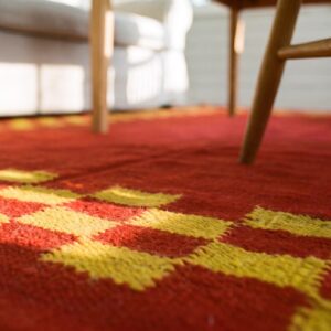 Antique Navajo - Rio Grande Small Scatter Size Wool Red Rug (SKU 25543) - in-room detail