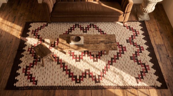 Antique navajo small scatter size wool beige rug 2 Antique navajo small scatter size wool beige rug (sku 23620) - styled overhead view