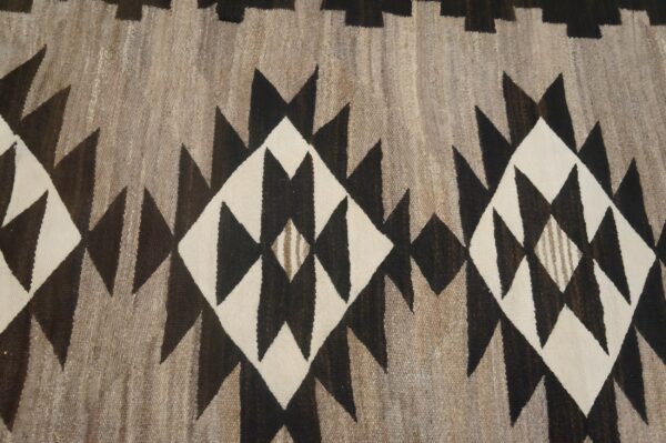 Antique navajo small scatter size wool black, grey rug 10 Antique navajo small scatter size wool black, grey rug (sku 24191) - room view