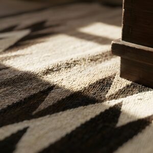 Antique Navajo Small Scatter Size Wool Black, Grey Rug (SKU 24191) - in-room detail