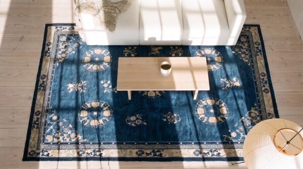 Antique navy blue chinese room size peking carpet (sku 21788) - styled overhead view