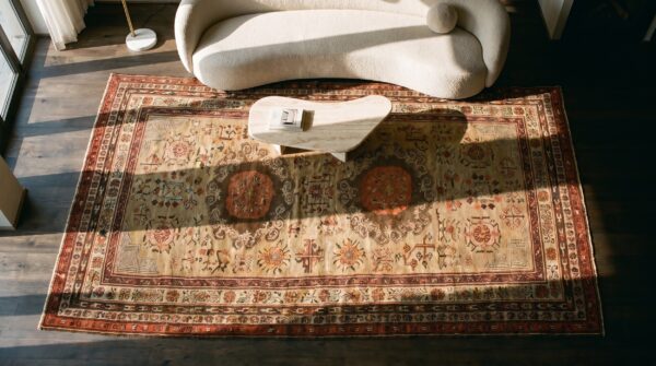 Neutral color antique tribal long and narrow size east turkestan khotan rug 2 Neutral color antique tribal long and narrow size east turkestan khotan rug (sku 19222) - styled overhead view