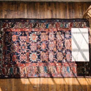 Antique NW Persian Allover Tribal Wool Hand Knotted Pile Blue Rug (SKU 20179) - styled overhead view