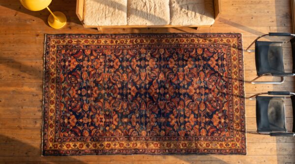 Antique nw persian blue color allover herati fish design hand knotted pile rug 2 Antique nw persian blue color allover herati fish design hand knotted pile rug (sku 21180) - styled overhead view