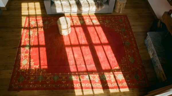 Antique open color red field turkish oushak room size wool rug 2 Antique open color red field turkish oushak room size wool rug (sku 24799) - styled overhead view