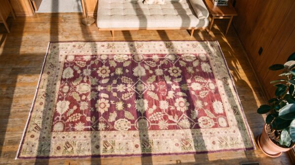 Antique oushak hallway runner wool coral rug 2 Antique oushak hallway runner wool coral rug (sku 20789) - styled overhead view