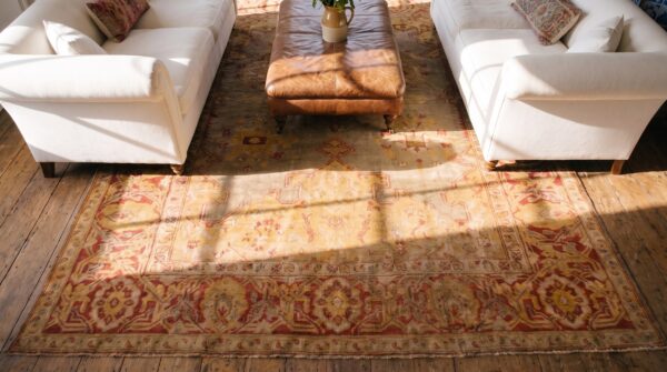 Antique oushak turkish medallion coral / salmon / pink 1880s rug 2 Antique oushak turkish medallion coral / salmon / pink 1880s rug (sku 24696) - styled overhead view