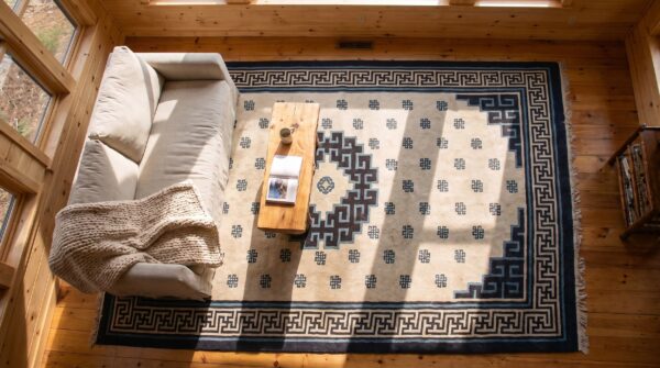 Antique oversized chinese - mongolian knotted rug (sku 23338) - styled overhead view