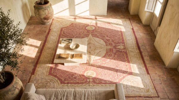 Antique oversized coral aubusson french flat weave rug 2 Antique oversized coral aubusson french flat weave rug (sku 17233) - styled overhead view