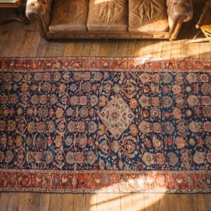 Antique Oversized N.W. Persian Persian Knotted Rug (SKU 17285) - styled overhead view