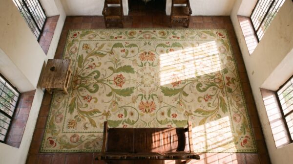 Antique oversized portugal floral, medallion stitched rug 2 Antique oversized portugal floral, medallion stitched rug (sku 25112) - styled overhead view