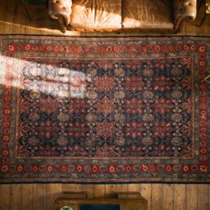 Antique Oversized Red and Blue Jewel Tones Persian Bidjar Rug (SKU 19323) - styled overhead view
