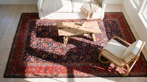 Antique oversized sarouk persian geometric knotted rug 2 Antique oversized sarouk persian geometric knotted rug (sku 24515) - styled overhead view