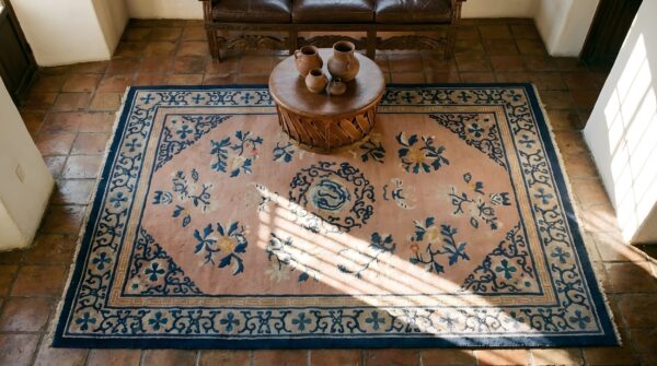 Antique peking chinese wool coral hand knotted pile rug (sku 25244) - styled overhead view