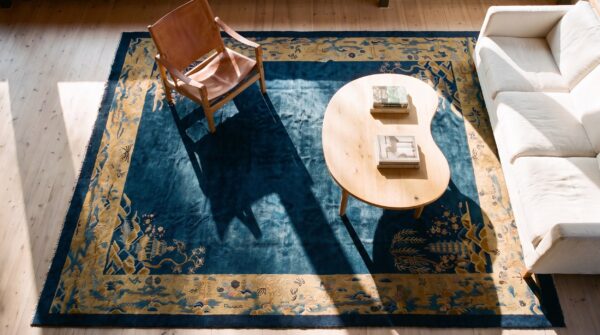 Antique peking room size wool blue navy, camel rug (sku 24704) - styled overhead view