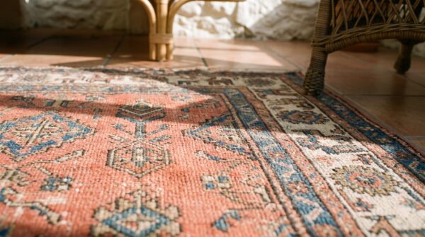Antique persian afshar small scatter size tribal wool pile coral area rug 9 Antique persian afshar small scatter size tribal wool pile coral area rug (sku 19833) - in-room detail