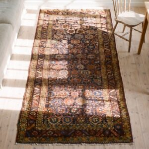 Antique Persian Bakshaish Tribal Floral Hallway Runner Rug (SKU 24247) - styled overhead view
