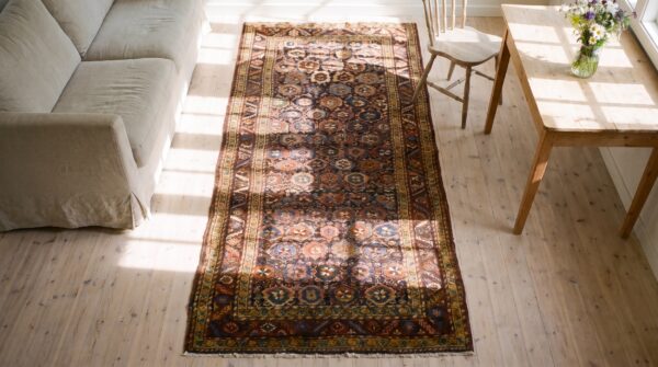 Antique persian bakshaish tribal floral hallway runner rug 2 Antique persian bakshaish tribal floral hallway runner rug (sku 24247) - styled overhead view