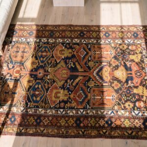 Antique Persian Geometric Medallion Hand Knotted Pile Rug (SKU 19375) - in-room detail