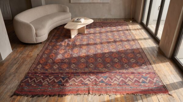 Antique persian wool multicolor jewel tones verne hand knotted rug 2 Antique persian wool multicolor jewel tones verne hand knotted rug (sku 21466) - styled overhead view