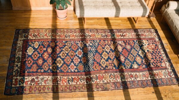 Antique persian n. W. Persian blue 1890s hallway runner rug (sku 21409) - styled overhead view