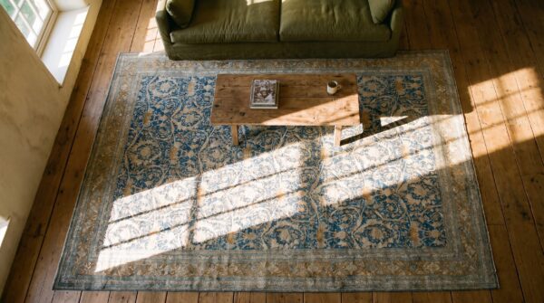 Antique persian tabriz carpet 11'6"×16' navy mostofi pattern, rust border, circa 1920 (sku 19512) - styled overhead view