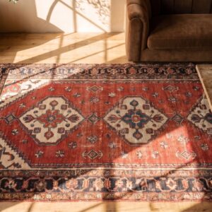 Antique Persian Tribal Geometric Red Kurdish Long and Narrow Size Rug (SKU 21951) - styled overhead view