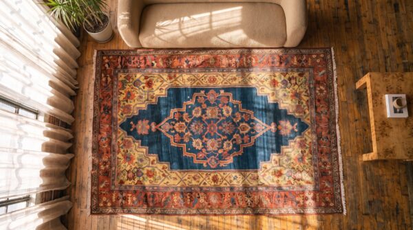 Antique primitive tribal geometric medallion design persian bidjar rug 2 Antique primitive tribal geometric medallion design persian bidjar rug (sku 21623) - styled overhead view