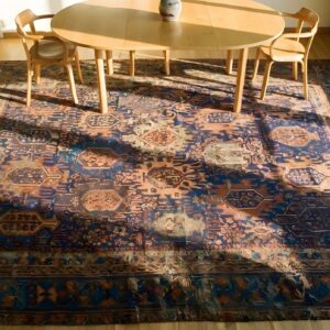 Primitive Tribal Antique Persian Baluch Shabby Chic Distressed Rug (SKU 24970) - styled overhead view