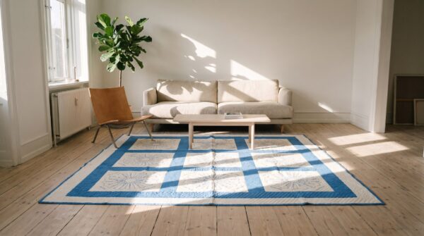 Antique quilt allover floral needlework rug (sku 20630) - room view