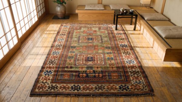 Rare antique green color tribal caucasian kazak double niche prayer design rug 2 Rare antique green color tribal caucasian kazak double niche prayer design rug (sku 21380) - styled overhead view