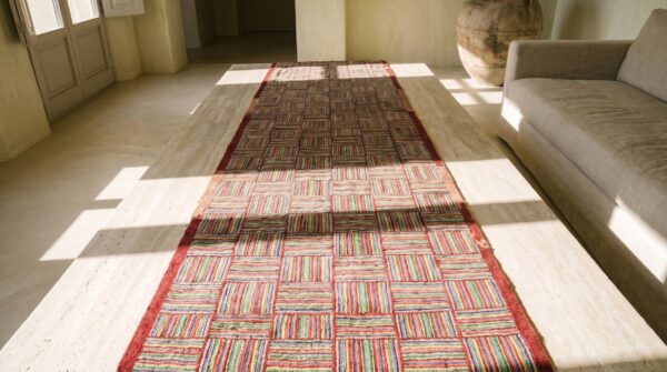 Rare pair of antique american folk art jewel tone hooked hallway runner rugs (sku 19226) - styled overhead view