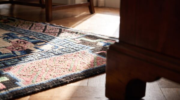Rectangle 1900s ivory beige cream white floral medallion antique hand knotted pile wool rug 13 Rectangle 1900s ivory beige cream white floral medallion antique hand knotted pile wool rug (sku 21831) - in-room detail