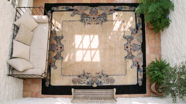 Rectangle 1920s room size chinese - art deco knotted antique wool ivory rug (sku 23335) - styled overhead view