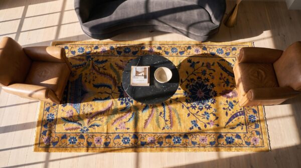 Rectangle wool 1920s antique yellow chinese art deco rug (sku 24710) - styled overhead view