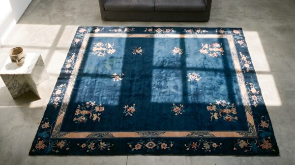 Rectangle 1930s floral hand knotted pile antique blue wool rug 2 Rectangle 1930s floral hand knotted pile antique blue wool rug (sku 22697) - styled overhead view
