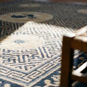 Wool Rectangle Geometric Medallion 1900s Antique Coral / Salmon Pink Hand Knotted Pile Rug (SKU 25660) - in-room detail