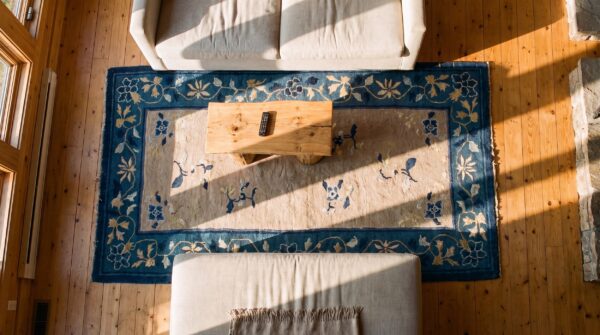 Rectangle hand knotted pile antique ivory beige cream white 1920s wool rug (sku 24205) - styled overhead view