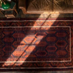 Antique Red Afghanistan Allover Geometric Hand Knotted Pile Rug (SKU 22113) - styled overhead view