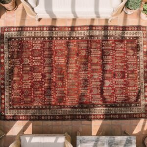 Red Antique Allover Tribal Design Caucasian Shirvan Rug (SKU 21571) - styled overhead view